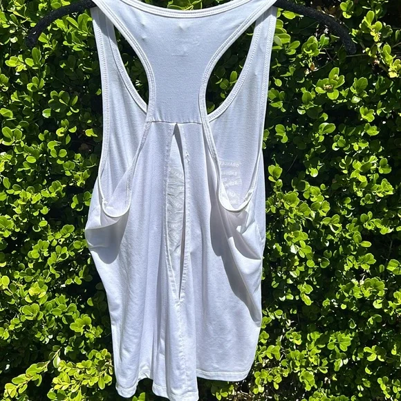 Orangetheory white tank with gold lettering and open slit in back - Picture 4 of 9